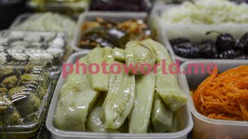 6 Marinated zucchini and pickles on the counter_s